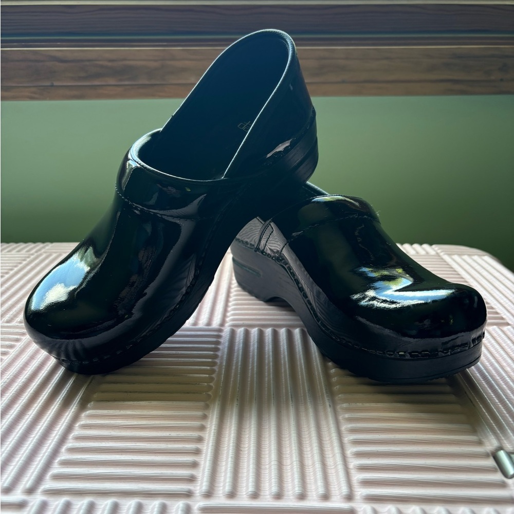 Never worn Dansko Black Patent Leather Clogs